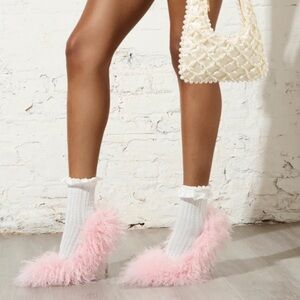 Pink furry pumps